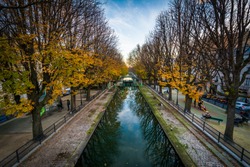 Autumn color along Canal Saint-Martin in Paris, France.