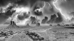 Storm approaching Monument Valley, USA. Aerial panoramic view in black and white