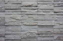 texture wall of gray bricks stone for background