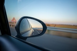 The road from the vehicle's mirror