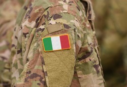 Flag of Italy on soldiers arm (collage).