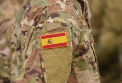 Flag of Spain on soldiers arm (collage).