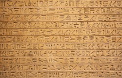 Egyptian hieroglyphs on the wall