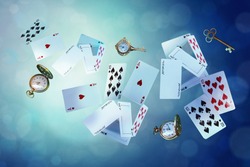 Wonderland background. Playing cards, pocket watch, key,  falling down the rabbit hole. Horizontal banner.