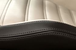 Detail of leather car seat. Horizontal photo.