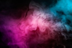 Abstract smoke steam moves on a black background . The concept of aromatherapy.