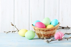 Easter eggs on a blue wooden table