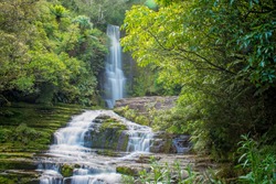 McLean Falls in the Catlins region of Southland, New Zealand - taken with slow shutter speed to blur water to a silky appearance