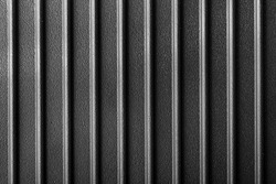 ribbed cast iron surface, metal texture, textured black background