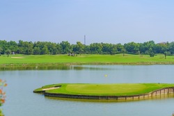 Golfcourse, Beautiful landscape of a golf court with trees and green grass.