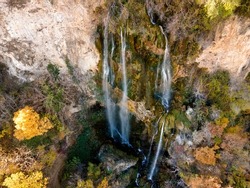 Aerial Autumn view of Polska Skakavitsa waterfall at Zemen Mountain, Kyustendil Region, Bulgaria