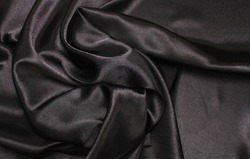 Black wave fabric silk. Abstract texture horizontal copy space background.