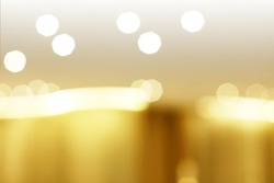 Abstract blur soft focus blinking light gold horizontal copy space background. 