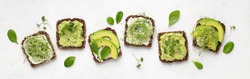 Dietary fitness toast with avocado, tofu cheese and microgreen, isolated on white, top view, panorama