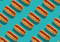 Set Of Tasty Hot Dogs With Sausage And Ketchup Flat Lying On Turquoise Background, Creative Repeat Pattern, Geometrical Design, Top View