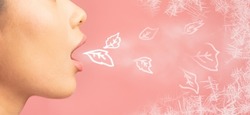 Side View Of Young Female Having Fresh Mouth Breath, Creative Collage With Drawned Mint Leaves And Freeze Air Flying Out Of Young Asian Woman's Mouth Over Pink Background, Cropped Shot, Panorama