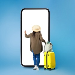 Black View Of Black Lady Using Big Smartphone Buying Travel Tickets Online Standing Near Huge Phone And Touching Blank Touchscreen On Blue Studio Background. Full Length, Square