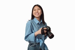 Happy Japanese Photographer Lady Posing Holding Photo Camera Over White Studio Background. Professional Creative Photography Career And Education Concept. Isolated
