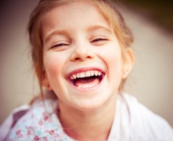 Portrait of a beautiful happy liitle girl close-up