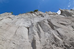 Low angle view of a cliff face during the day