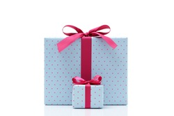 blue gift box on white background. Different sizes of the same shape gift box. A small gift box with a big gift box. 
