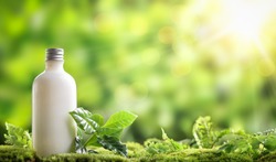 cosmetic bottle on nature background