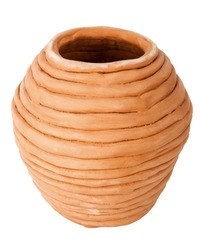 Unglazed handmade coiled pottery pot made of red clay isolated on white background. Teracota vase. Pottery basics.