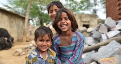 Smiling faces, young children smiling and having fun from rural part of India