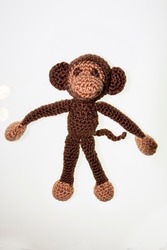 Crochet little toy cuddly monkey filled with absorbent cotton