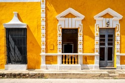 Typical old yellow house at the magical town of Izamal in Yucatan, Mexico