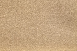 Texture canvas fabric as background light brown 