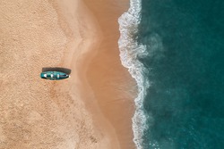 Aerial view of a beach in Cape May, New Jersey, USA with a lifeguard boat