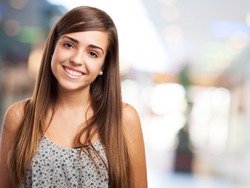 portrait of pretty young woman smiling closeup