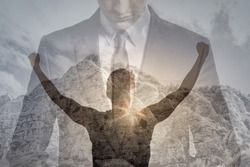 Physically, and mentally strong young businessman man with fist in the air feeling victorious and motivated. double exposure. 