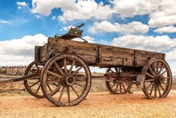 Old fashioned horse-drawn wagon, pioneer style. Vintage Americana buggy as used in the wild west, California, USA