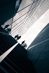 Street photography in Tokyo, detail of the architecture and silhouettes figure in the Ginza business district.