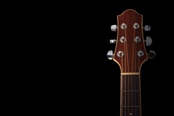 Guitar headstock on black background