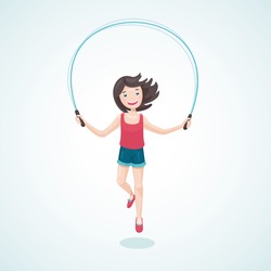 Young girl is jumping with a jump rope.