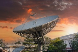 satellite dish radar antenna station in field. parabolic antennas. Big parabolic antenna against sky. Satellite dish at earth station with a sky.
