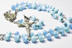 Holy Rosary.Latin: rosarium, in the sense of crown of roses or garland of roses, is a form of prayer used in the Church named for the string of prayer beads used to count the component prayers