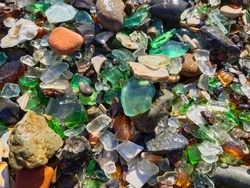 Glass pebbles on the seashore. Vladivostok, Glass Bay