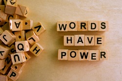 Words Have Power word cube on wood background ,English language learning concept