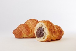 
croissant with chocolate filling on a white background