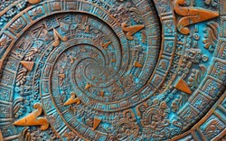 Bronze ancient antique classical spiral aztec ornament pattern decoration design background. Surrealistic abstract texture fractal Aztec spiral background. Bronze color spiral effect. Alien background