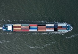 A Small Cargo Ship Carrying Containers Bird's Eye View