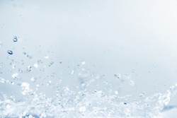 blue water splash and drop for drinking, abstract water and freshness concept background