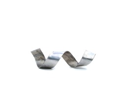 Aluminum shavings isolated. Twist metal spiral. Metal steel shavings.