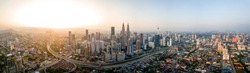 Scenic panoramic aerial view of Kuala Lumpur cityscape skyline, early morning sunrise scene, Malaysia .