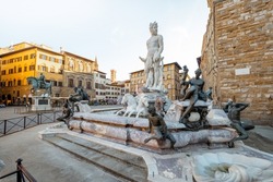 Morning view on fountain of Neptune on Signoria square in Florence. Concept of art and architecture of the italian renaissance