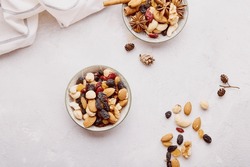 Healthy dessert, food concept. Assortment of nuts and raisins.
